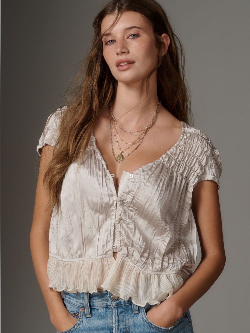 By Anthropologie Shirred Silken Blouse in the color Champagne Large NWT